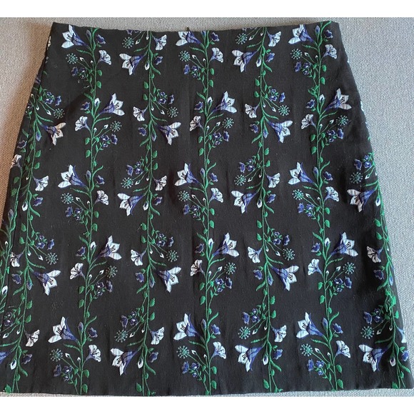 Ann Taylor Woman’s skirt size 12 black with green blue floral design lined FLAW - Picture 1 of 12